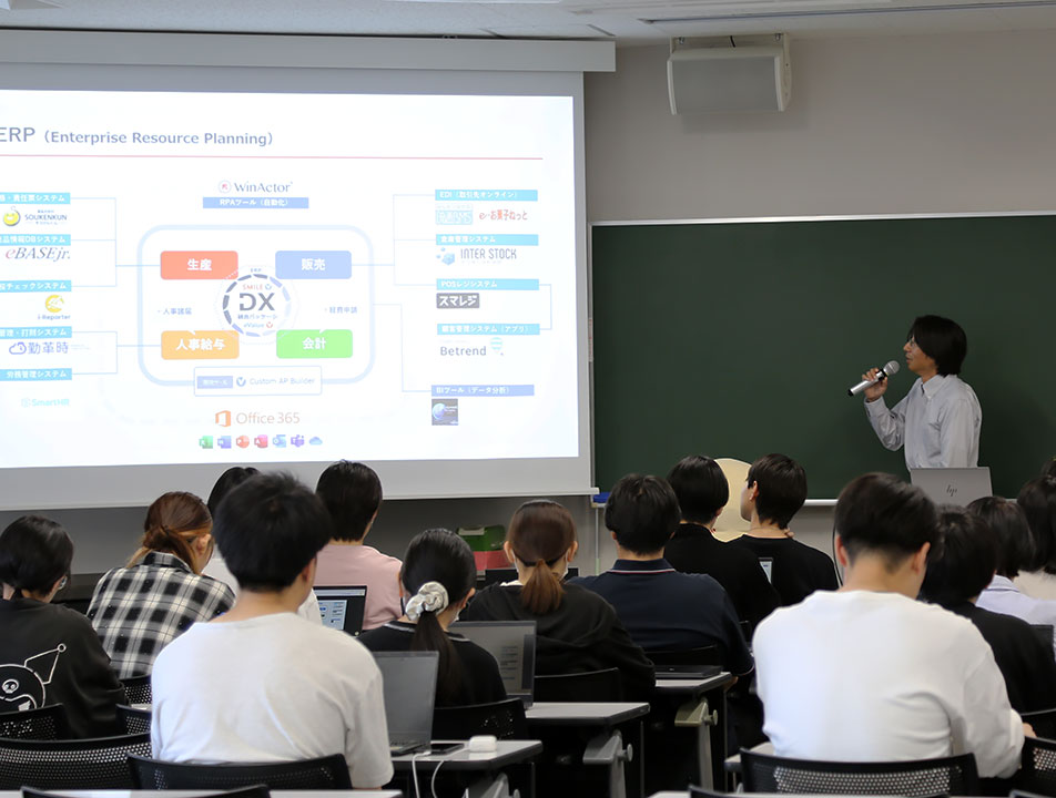 情報文化学科「データ処理応用」で「なごみの米屋」による特別講義を実施